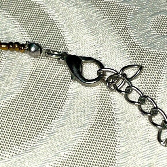 Asymmetrical bead necklace unique beads in green, blue, black, brown, & silver - Picture 3 of 7